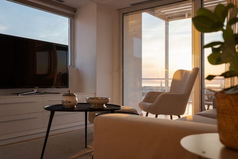 Deluxe Apartment, Sea View | Living area | 50-inch Smart TV with digital channels