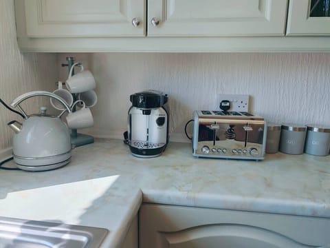 Tea and coffee station with kettle and toaster