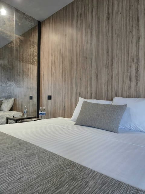 Standard Villa | Premium bedding, down comforters, in-room safe, laptop workspace