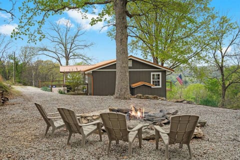 Remote private stone fire pit under the hill with views