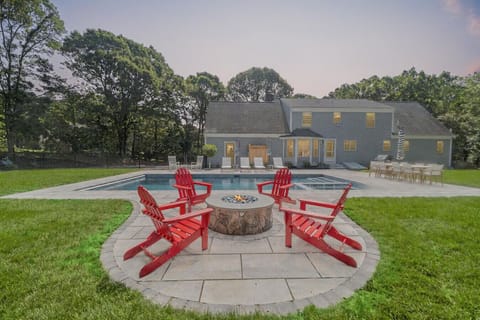 The pool area also includes a gas fire pit on the patio with 4 Adirondack chairs, ideal for evening relaxation or entertaining. Enjoy marshmallows by the fire in the evening.
