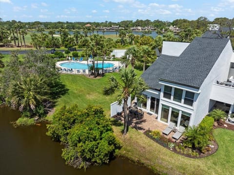Wake up to serene lagoon and golf course views from your private patio—perfect for morning coffee or sunset dining