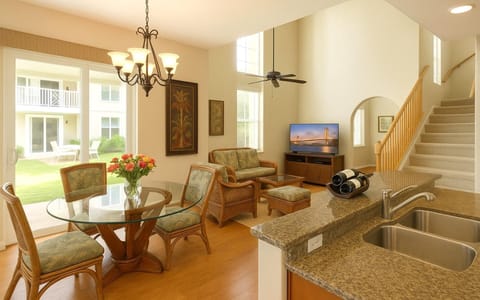 Elegant living room with serene views, plush seating, and natural light throughout WCV-306