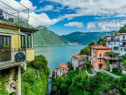 Water, Cloud, Sky, Building, Property, Mountain, Azure, Nature, Natural Landscape, Window