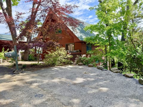 Front of house with extra parking