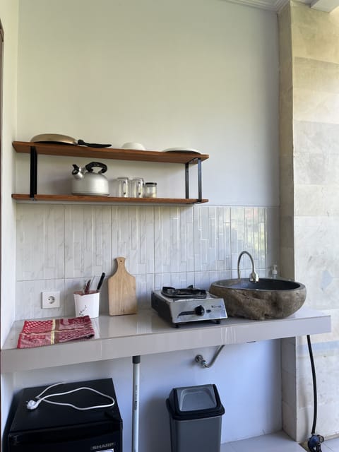 Suite, Balcony, Garden View | Private kitchen | Mini-fridge, stovetop, dishwasher, electric kettle