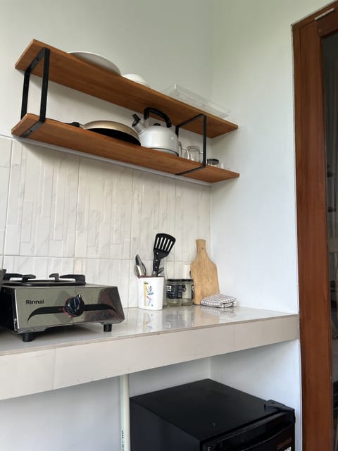 Suite, Balcony, Garden View | Private kitchenette | Mini-fridge, stovetop, dishwasher, electric kettle