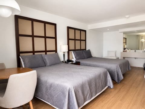 Standard Room, 2 Queen and 1 Single Bed, Non-Smoking | Desk, iron/ironing board, free WiFi, bed sheets
