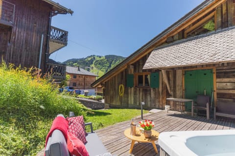Enjoy views of the Pléney from the chalet garden and hot-tub
