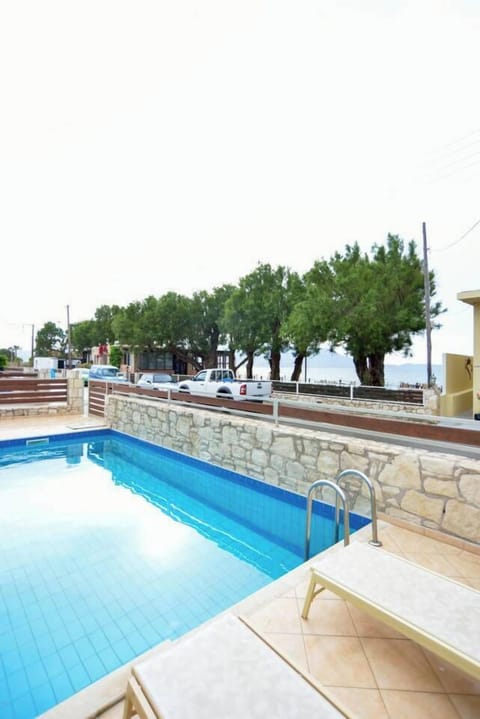 Refreshing Pool Overlooking the Sea and Tamaric Trees