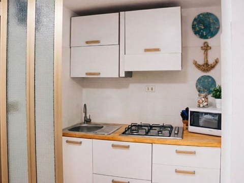 Wood, Flooring, Interior Design, Major Appliance, Kitchen, Home, Floor, Room, Cabinetry, Furniture