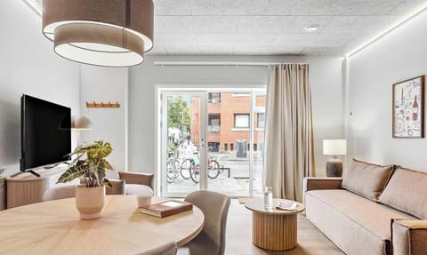 Room view with natural light and both blackout curtains and a thin layer of curtains, to ensure your privacy
