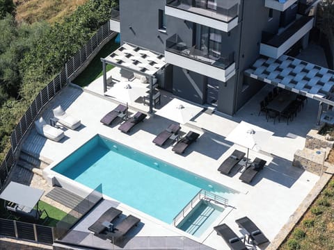 Heliodora Villa- A stylish oasis crafted for families & romantics.