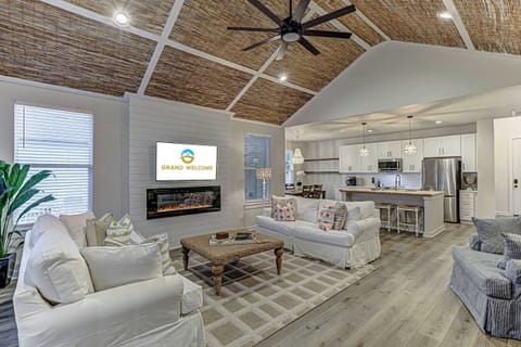 Bright living area with Smart TV and sofa sleeper