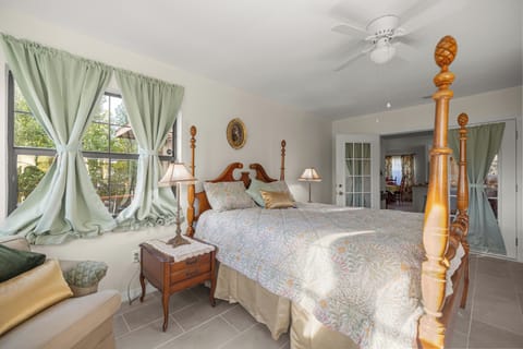 Sunlit guest bedroom with a bright and relaxing atmosphere.