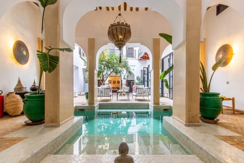 Outdoor pool, pool umbrellas, sun loungers