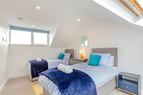 3rd bedroom with 2 single beds and views overlooking the countryside