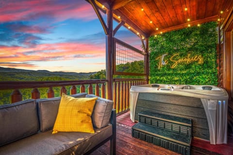 Soak under the string lights and unwind in this private hot tub.