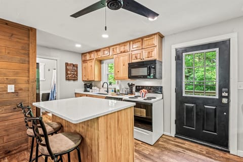 Start your mornings with coffee at the breakfast bar — your front-row seat to nature just outside the door.