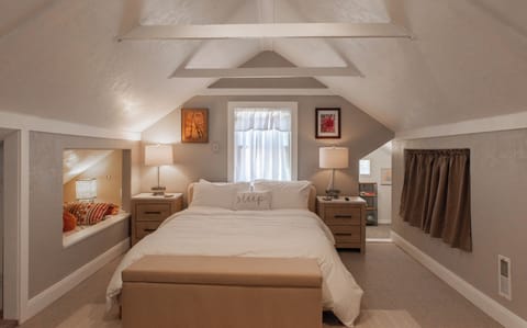 The Loft bedroom has a comfortable queen bed, luxurious linens and a cute built in Twin Bed.  Access to the play room is just off to the right