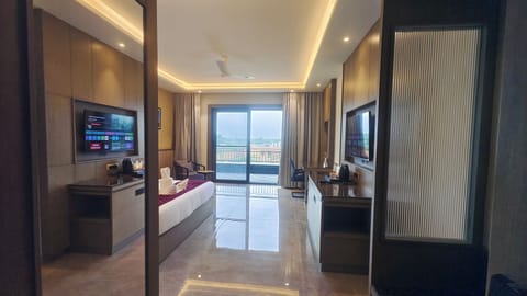 Premium Double Room, Balcony, Garden View | Minibar, in-room safe, desk, laptop workspace