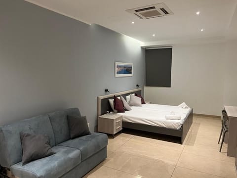 Double or Twin Room, Mobility Accessible | In-room safe, desk, laptop workspace, blackout drapes