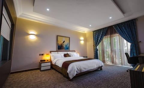 Economy Room, Balcony, City View | Desk, laptop workspace, blackout drapes, soundproofing