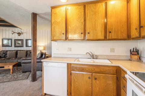 The open kitchen offers ample space & all the comforts of home