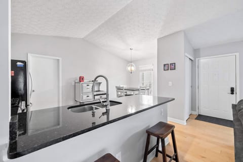 Sip morning coffee or grab a bite at the kitchen counter, with space for 2