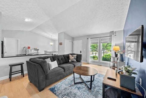 Curl up in the serene living room & stream your favorites on the smart TV