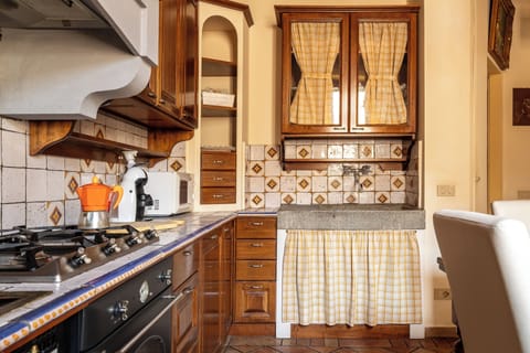 Apartment | Private kitchen | Fridge, oven, stovetop, espresso maker