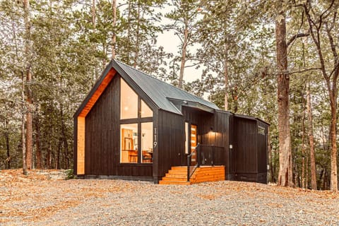 Exterior: Modern design meets the great outdoors in this serene forest escape!