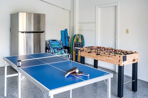 Plenty of games and beach equipment in the garage.