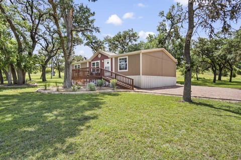 Your cozy escape awaits! Nestled among serene trees, this charming rental offers peace and comfort for your perfect getaway.