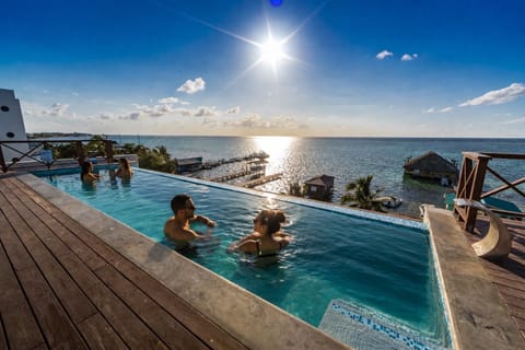 Outdoor pool, open 8:00 AM to 10:00 PM, pool umbrellas, sun loungers