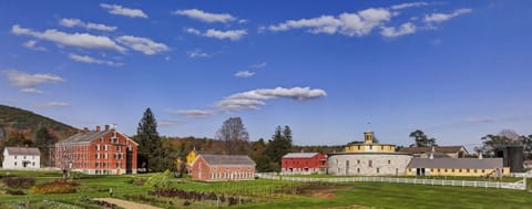 Step back in time at the Hancock Shaker Village Museum, a living history museum with restored Shaker buildings, craft demonstrations, farm animals, and beautiful countryside views.