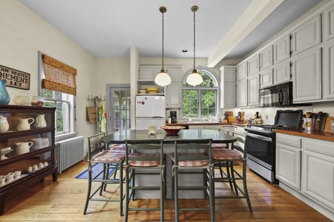 Open kitchen with island seating for six.