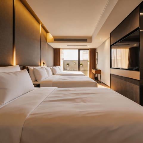 Family Triple Room | Premium bedding, down comforters, memory foam beds, minibar (free items)