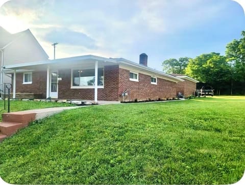 Large open empty lot next door giving more privacy double wide driveway in back 