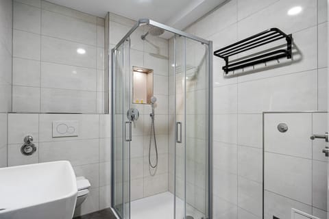 Hair dryer, towels, soap, shampoo