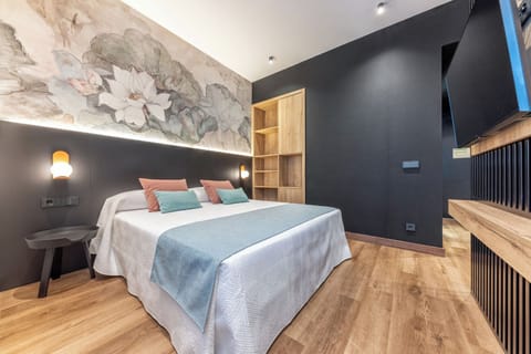 Deluxe Double Room | In-room safe, desk, laptop workspace, blackout drapes