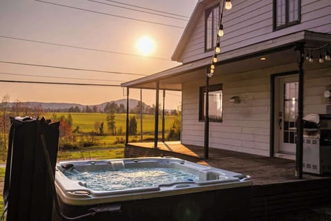 Private hot tub surrounded by nature, offering a perfect spot to relax and unwind.