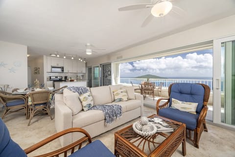 Bright open-concept living area with breathtaking ocean views.