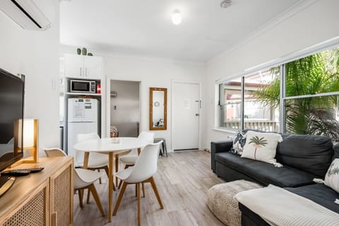Come together in the bright and airy living area after a day exploring Victor Harbor.