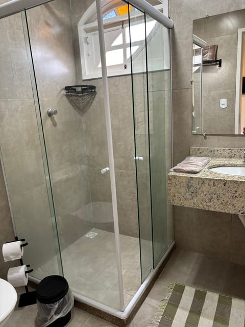 Deluxe Suite, Garden View | Bathroom | Shower, towels, soap, shampoo