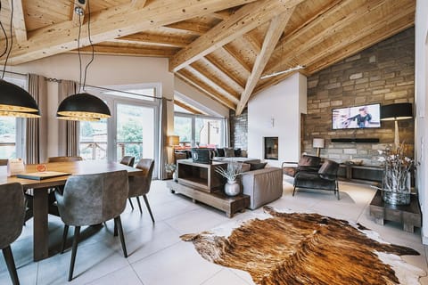 Penthouse, 4 Bedrooms | Living area | LCD TV