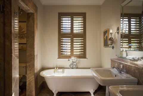 Terroir Cottage | Bathroom | Rainfall showerhead, free toiletries, hair dryer, bathrobes