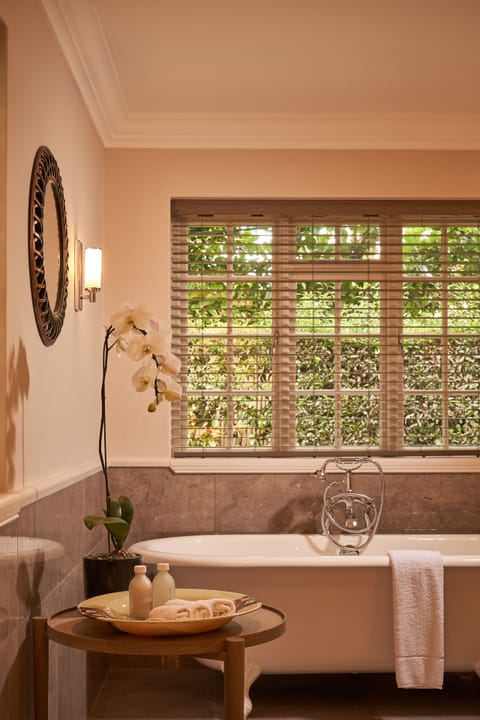 Premium Studio Suite | Bathroom | Designer toiletries, hair dryer, bathrobes, slippers