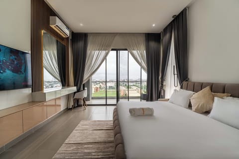 Luxury Apartment, 2 Bedrooms, Balcony, City View | In-room safe, desk, laptop workspace, iron/ironing board