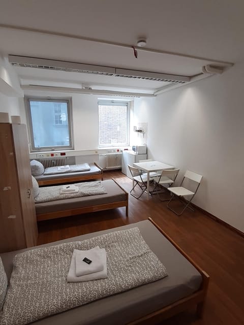 Quadruple Room (#213) | Individually furnished, iron/ironing board, free WiFi, bed sheets